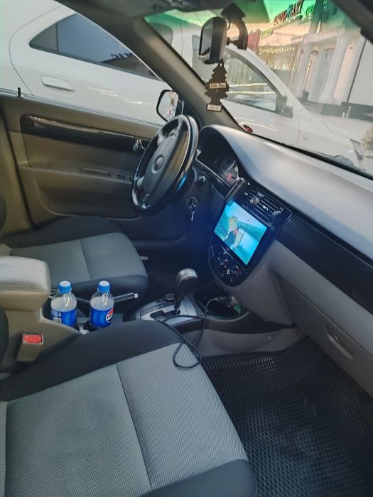 Lacetti gentra sotiladi 2021 yil Tesla manitor 4 eshik sh