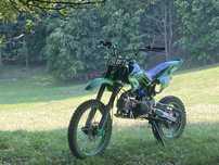 Vand cross 125 cc,functioneaza impecabil motorul este in 4 timpi!