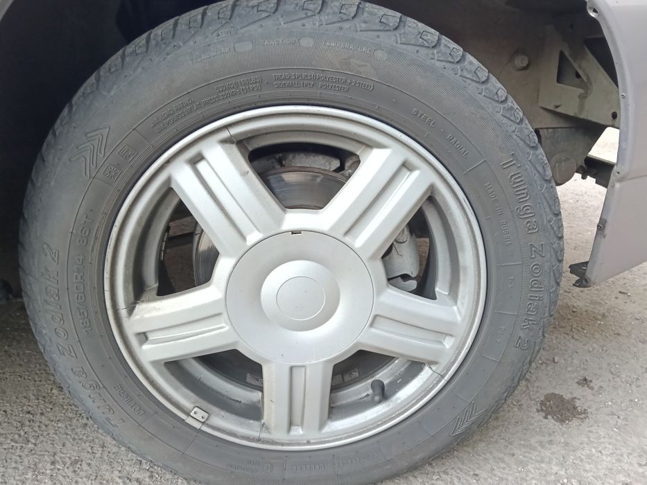 Комплект титановых дисков с летней резиной.