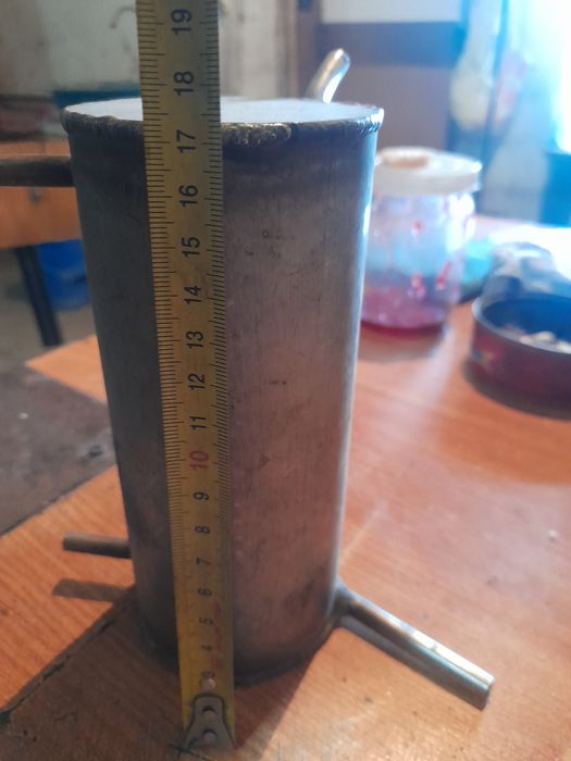 Дистиллятор из нержавеющей стали.