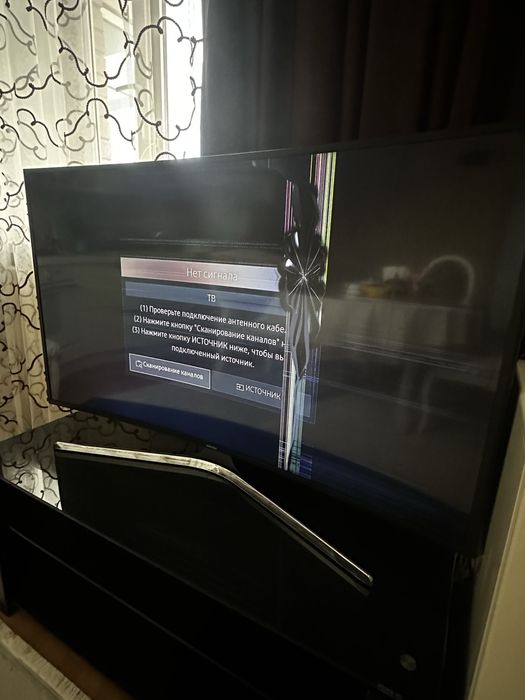 Телевизор с дефектом экрана