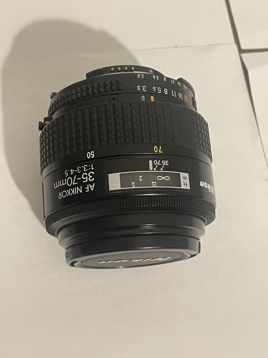 Kit Nikon F-501 cu acte originale West Germany - 2 obiective + blitz