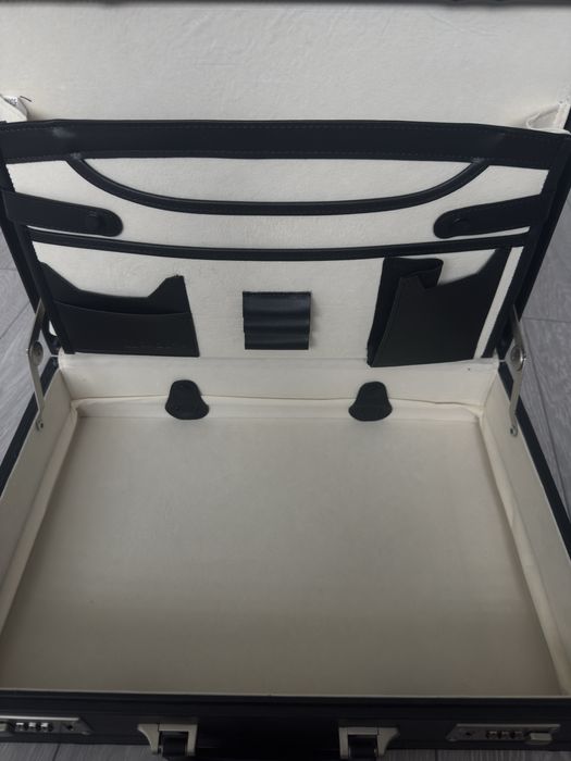 Servietă elegantă din piele neagră MONOLITH 2350 – stare excelentă