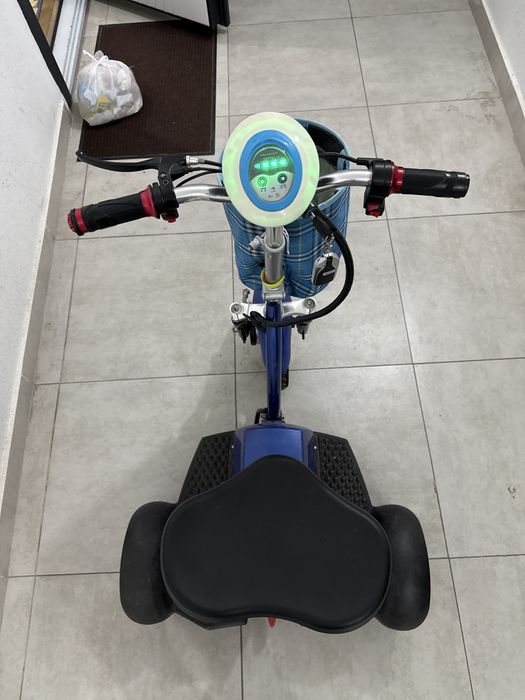 Электроскутер трехколесный