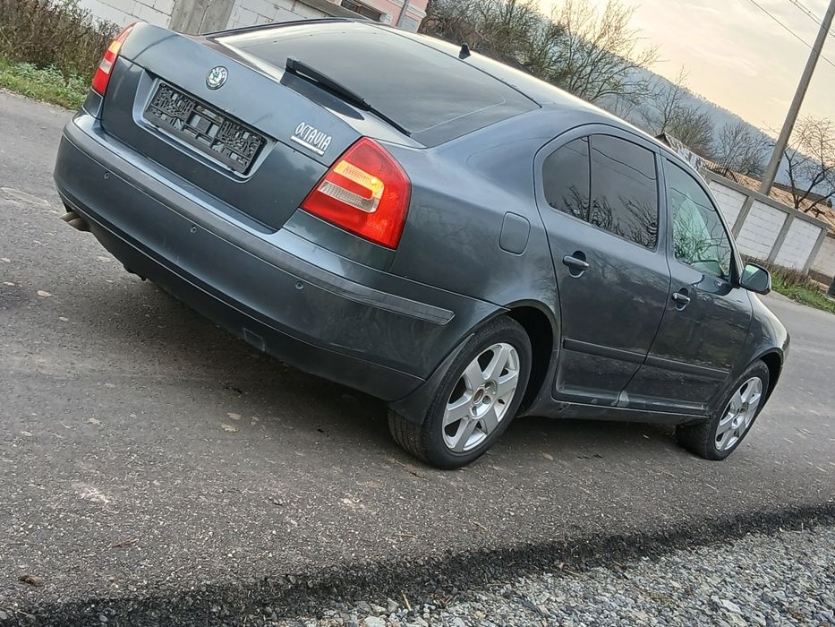 bara aripa use tragar capota grila far stop skoda octavia 2 2007