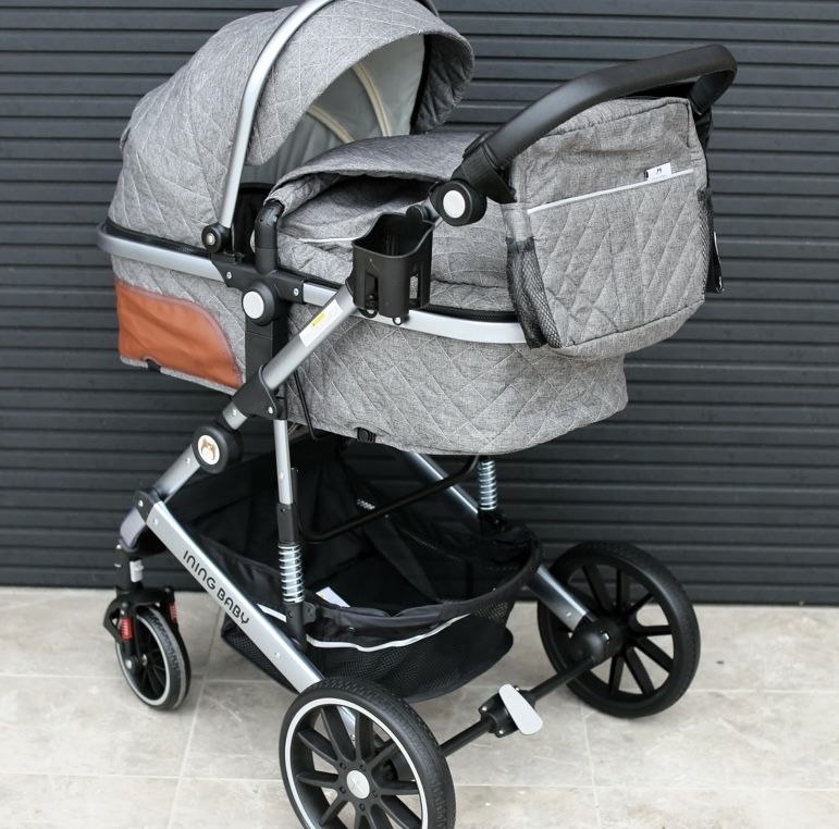 Продам универсальную 2 в 1 коляску «Ining baby”