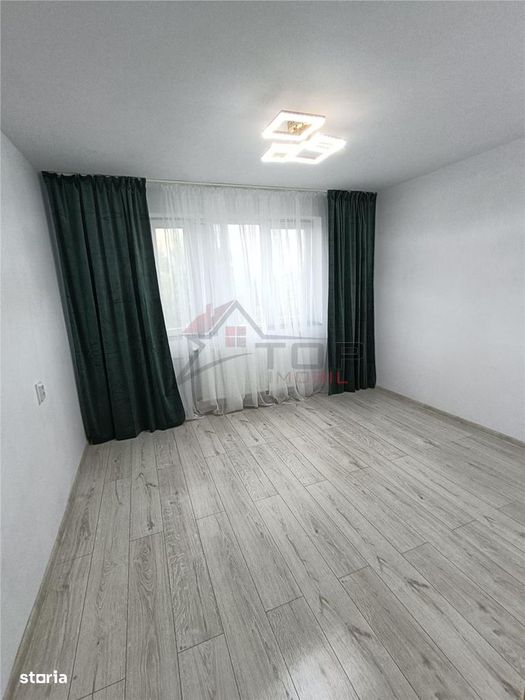 Vanzare garsoniera transformata din camera de camin