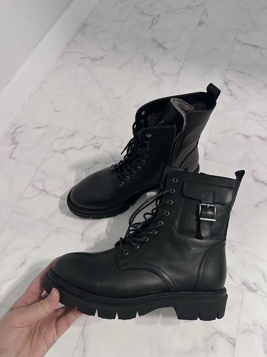 Новые кожаные сапоги