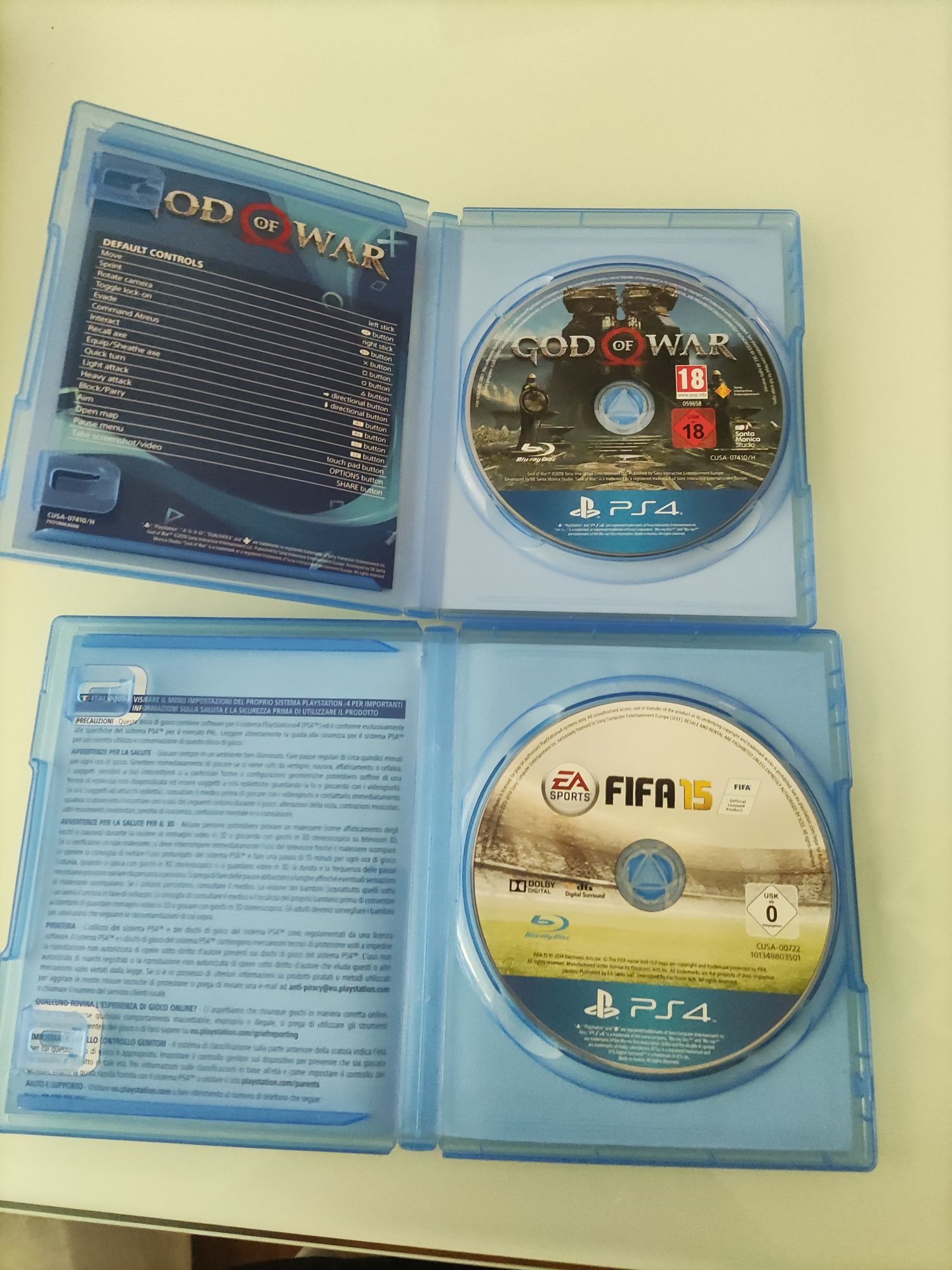 2 jocuri PS4:God of war și FIFA 15