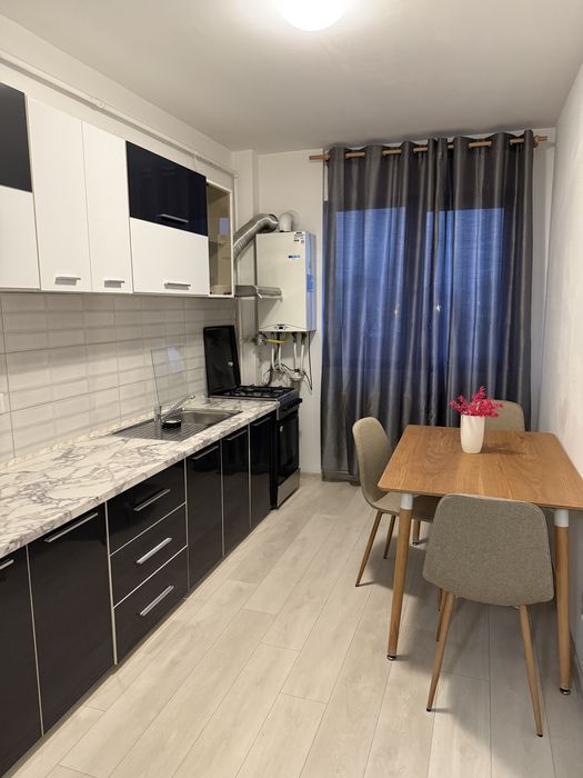 Garsoniera bloc nou,zona centrala,loc de parcare