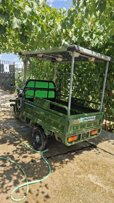 Triciclu electric cu panou solar