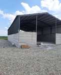 Hale metalice cu tabla pe perete si perete din beton pentru cereale