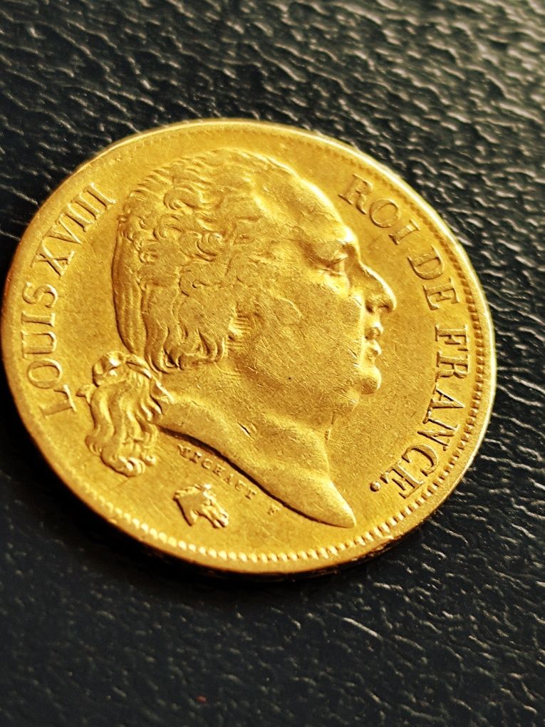 20 франка 1824 год.,Луи XVIII, злато 6.45 гр.,900/1000 (21.6 карата)