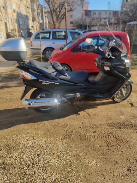 Suzuki Burgman 400 sau Schimb