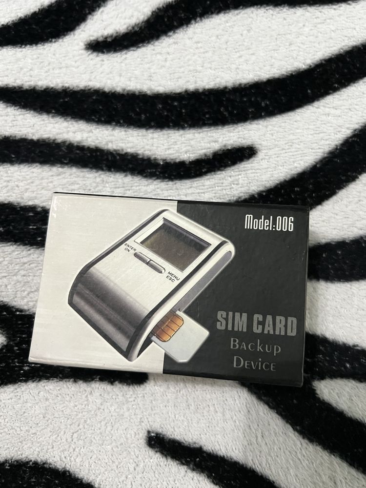 Vand sim card back-up device
