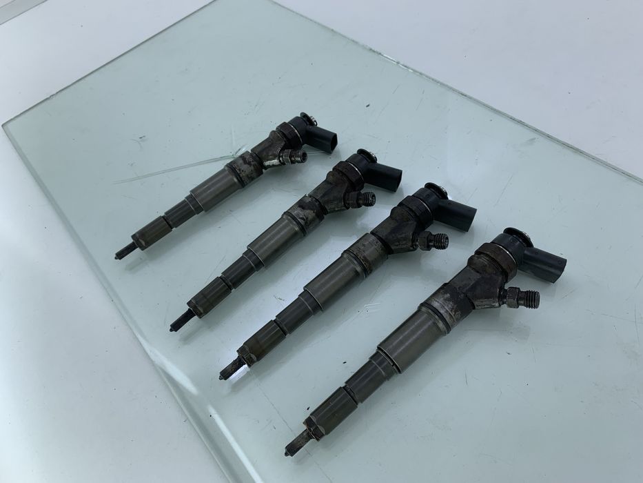 Dezmembrez Injector de pe BMW SERIA 1 E87 2004-2009