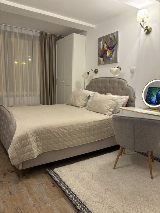 Apartament 2 camere modern, complet utilat si mobilat+loc de parcare