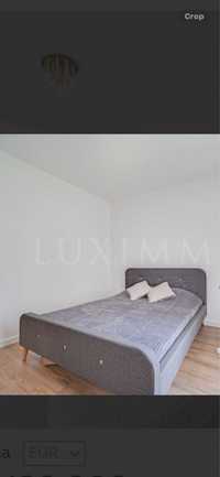 Спалня в сив цвят с матрак