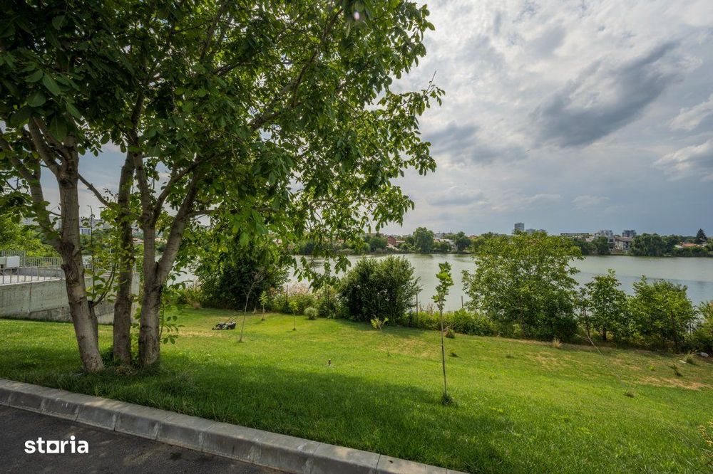 Apartament Modern cu Vedere la Lac - Complex Privat pe Malul Lacului