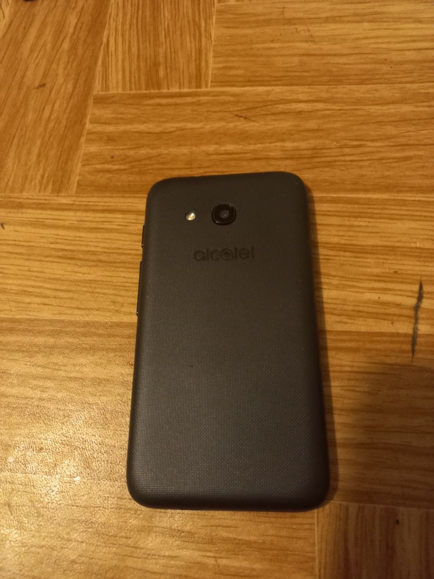 Alcatel U3 чисто нов