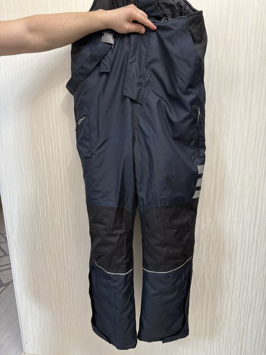 Продам новый зимний комбинезон