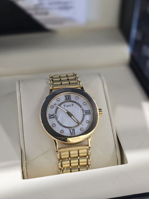 Продам классические часы Tissot в золоте 750 пробы