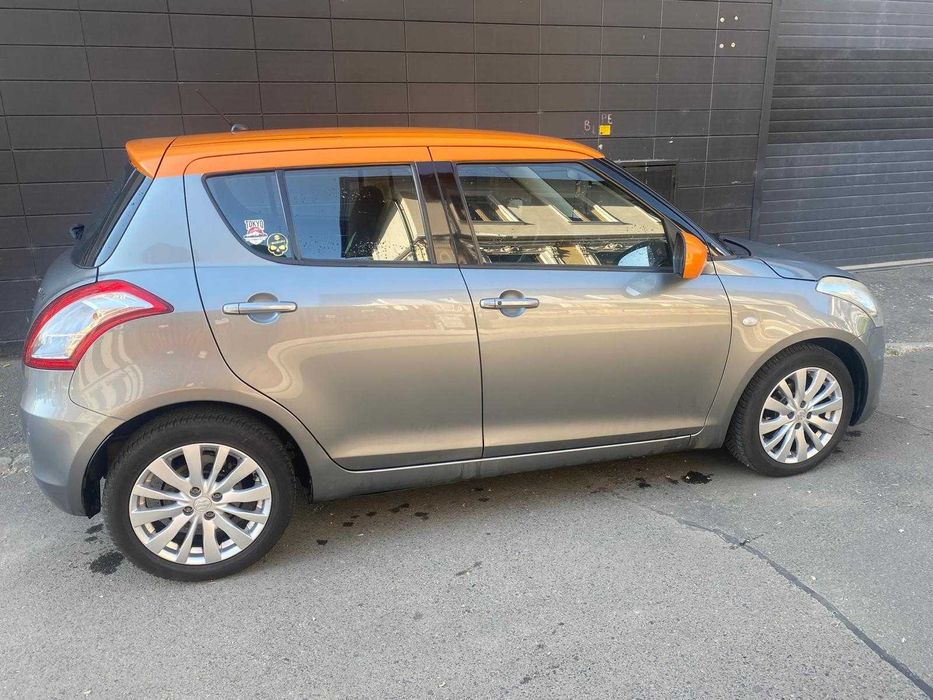 Suzuki Swift 1.3 Benzina aspirat 2012 Gri met Climatronic, M Optionale