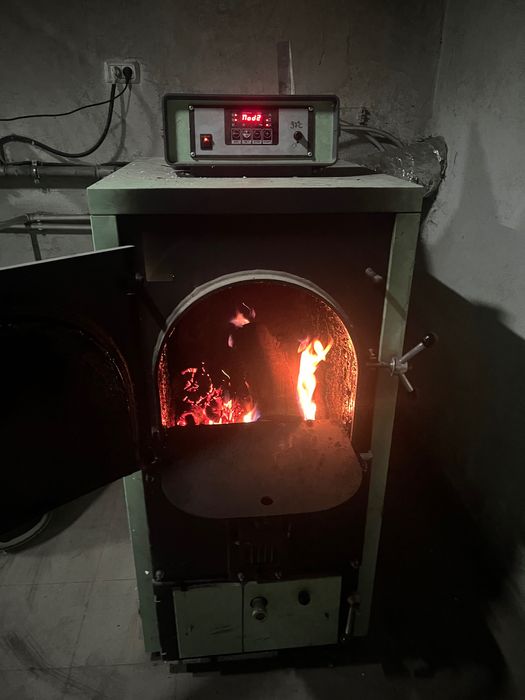 Vând centrală de lemne