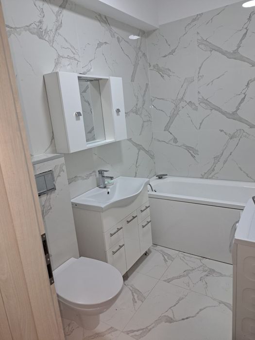 Închiriez sau vand la pretul de 70000 euro ap cu 2 camere in cartierul