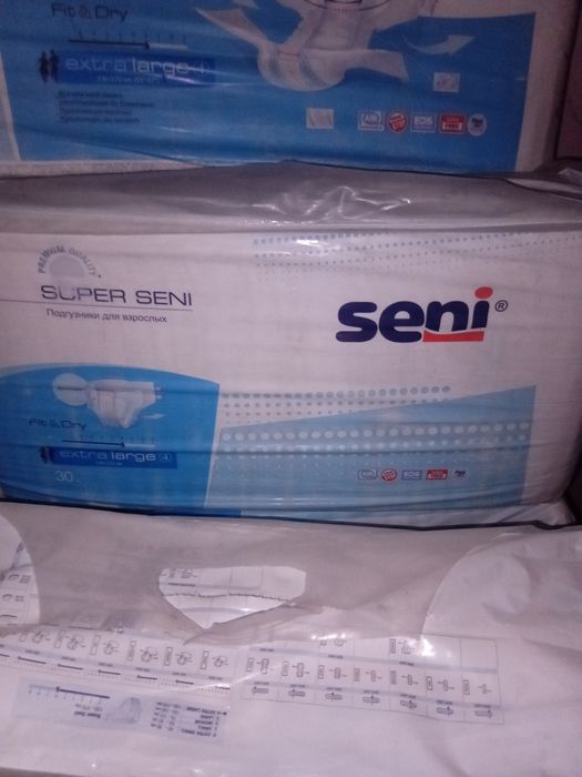 Продам подгузники сени 4 разм