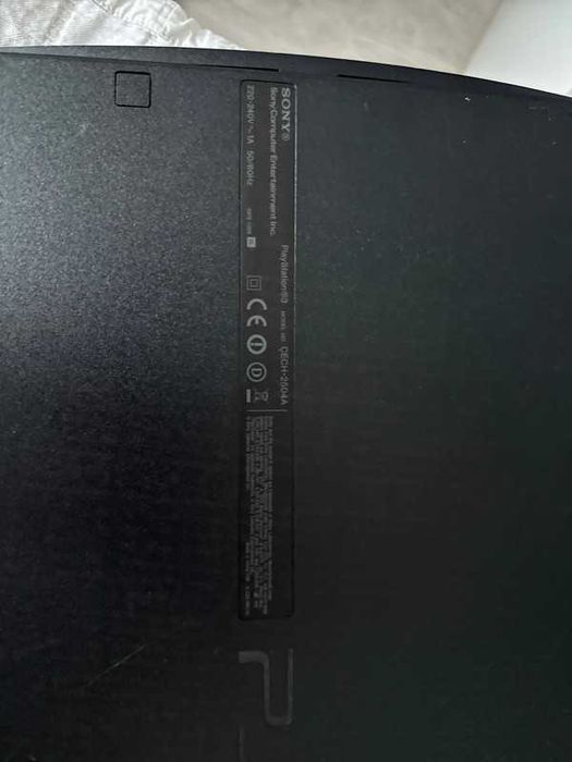 PlayStation 3 Slim + 2 Jocuri + Controller