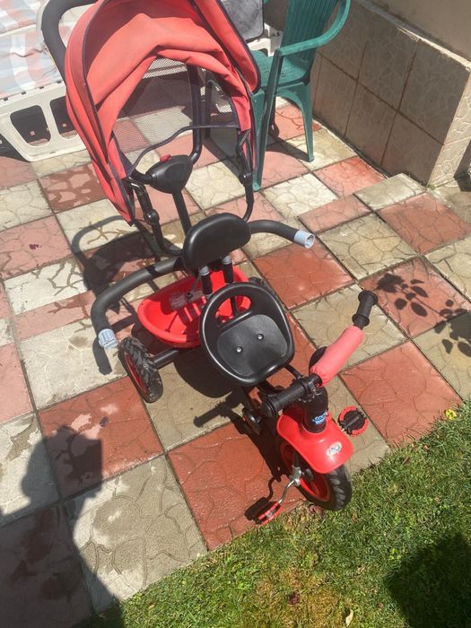 Vand tricicleta rosie