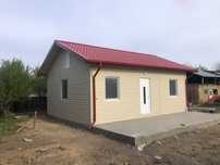 Casa modulara și garaje auto din structura metalica si panou sandwich