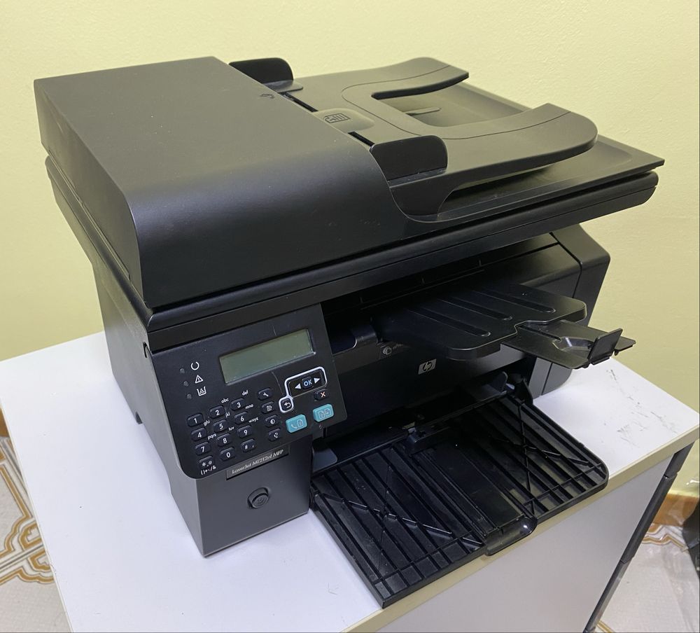 Multifunctionala HP M1212nf