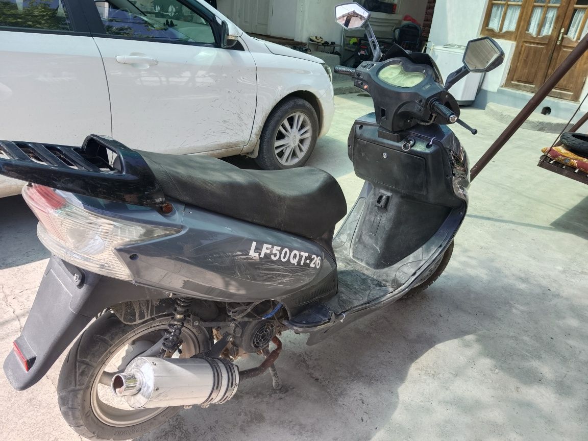 Скутер real moto