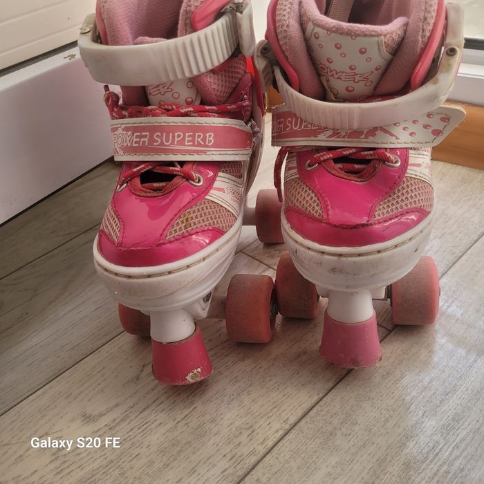 Роликовый коньки