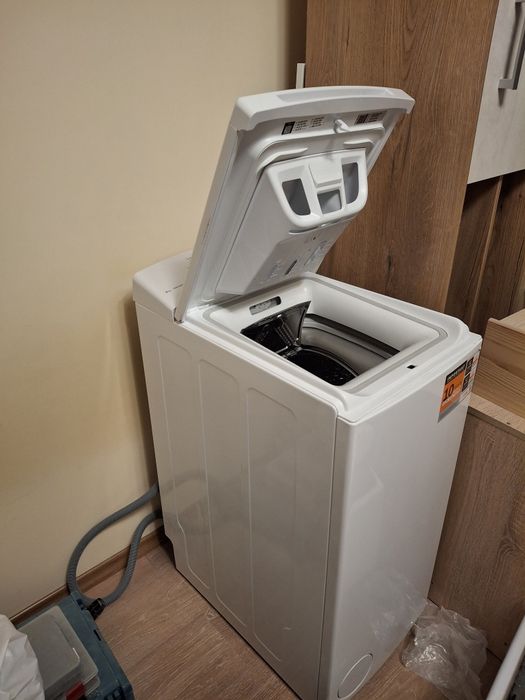 Пералня с горно зареждане Уърлпул