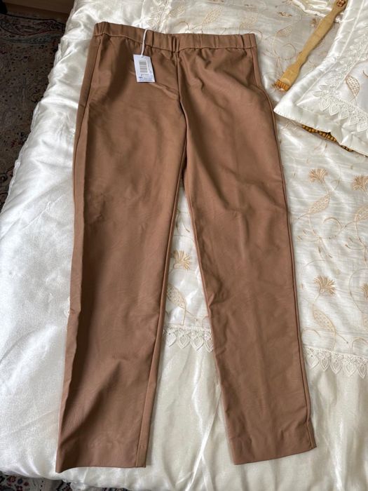 Брюки пройзводство Италия