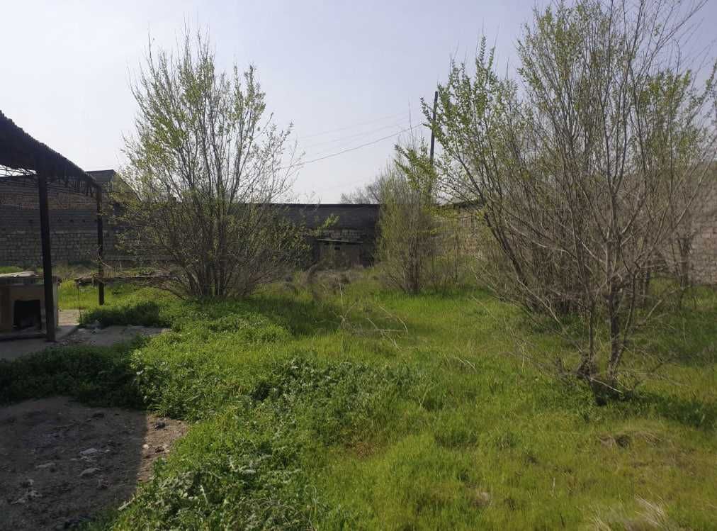 Продаётся 26 соток земли в центре города Алмалык