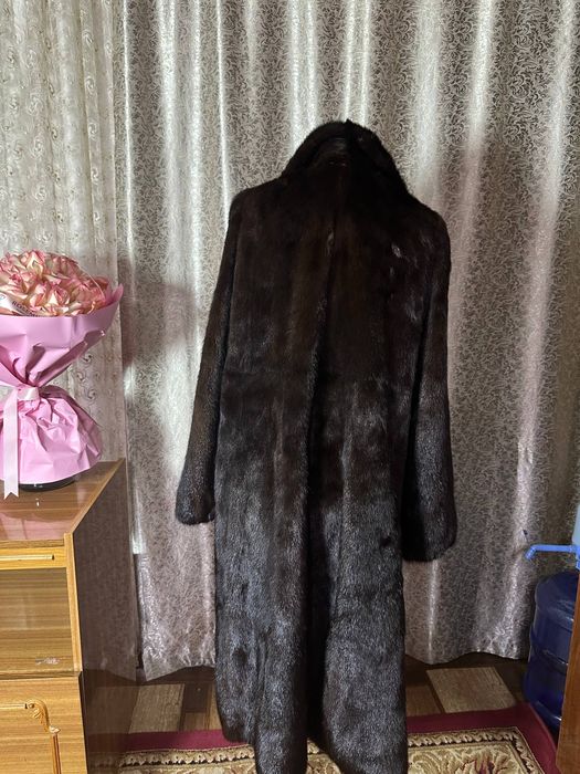 Натуральные норковые шубы большого размера.