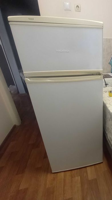 Продам рабочий холодильник на запчасти