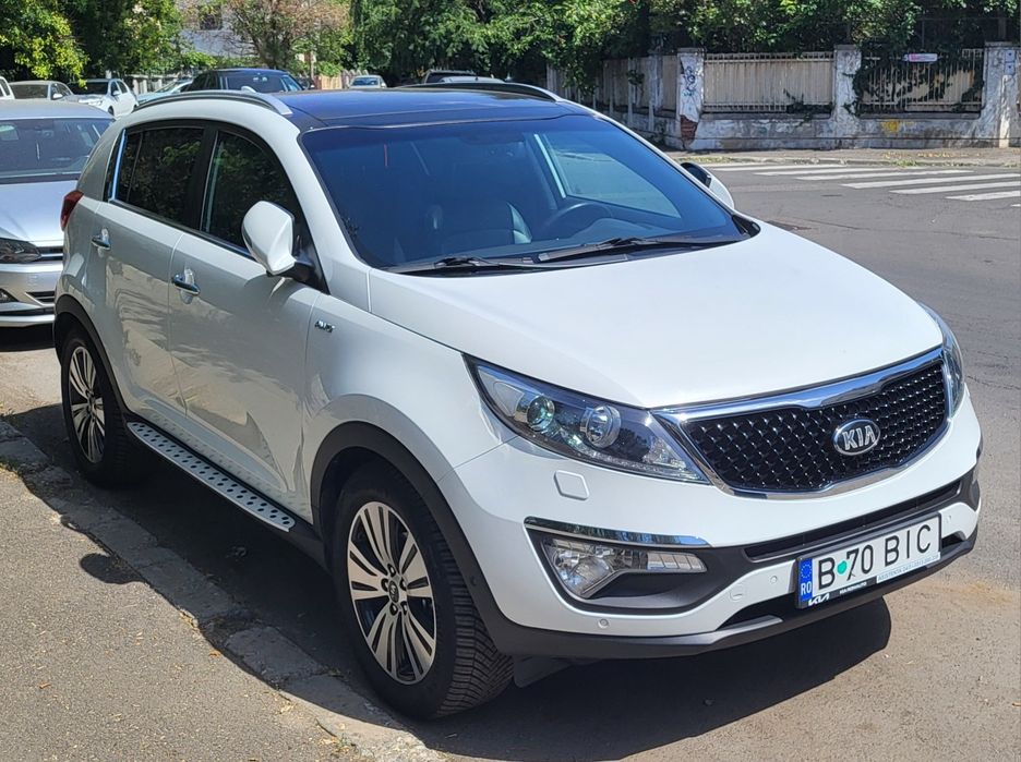 Kia Sportage ,4X4 ,automată ,trapă panormaic, alb perlat.