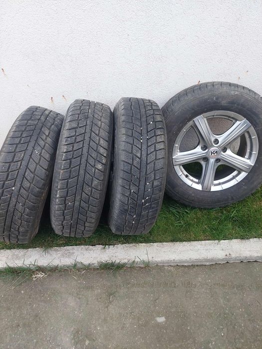 Vând 4 roti MS iarna-vara SUV 215 70 R16