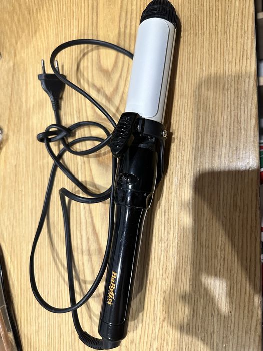Утюжок и плойка в одном. BaByliss. Она почти новая.