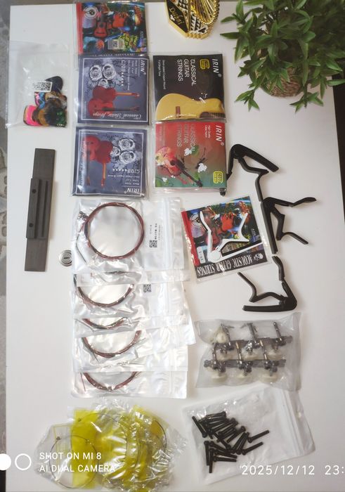 Запчасти для гитары и домбры струны колки каподастры медиаторы тиек дл