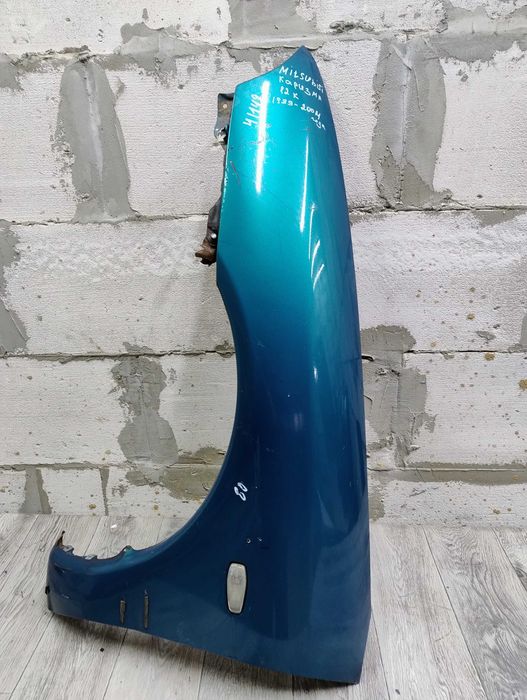 Крыло Митсубиши Каризма