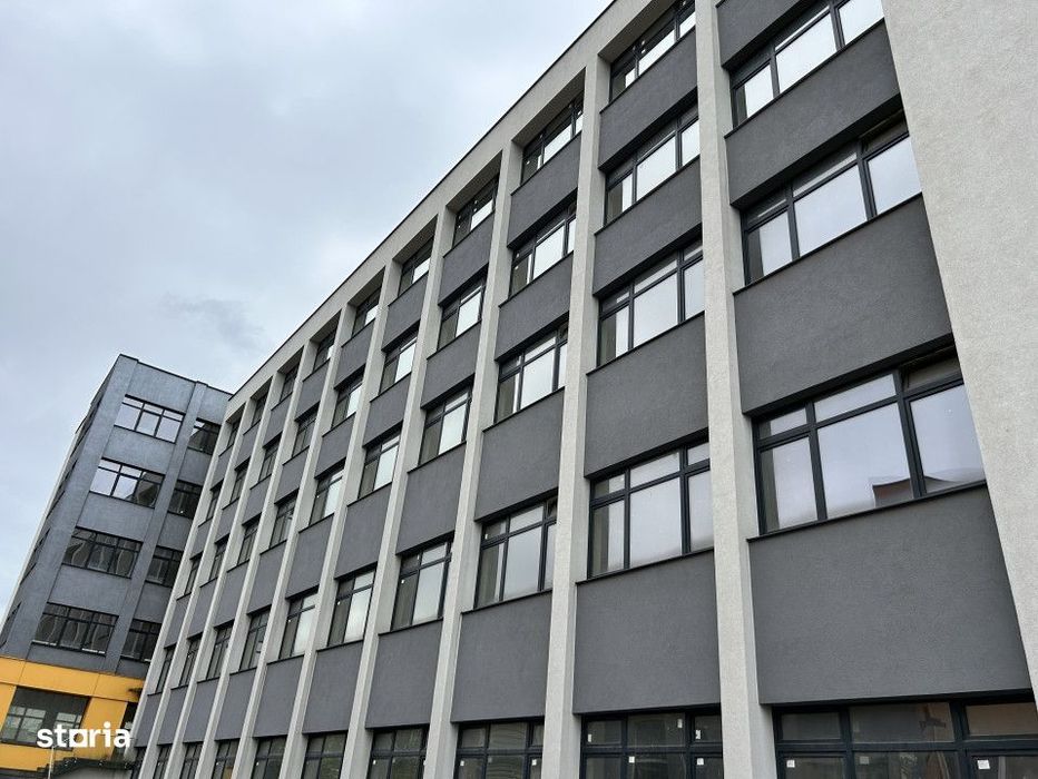 Cladire de vanzare D+P+4 cu 4670mp utili si curte 3650mp la 1280euro/m