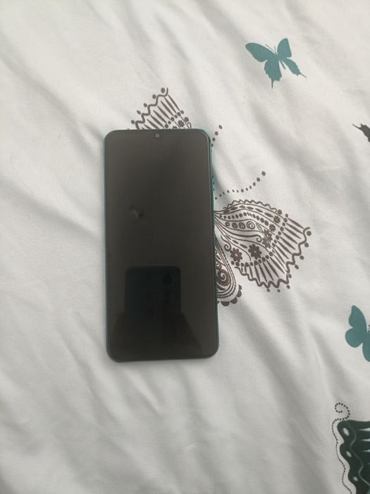 (București)Telefon Redmi doar cu defecte la suprafață