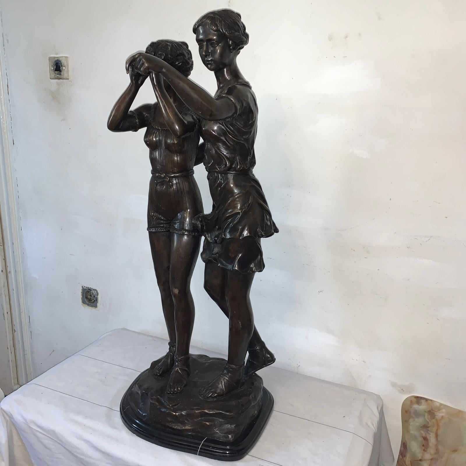 Statuie din bronz cu doua fete