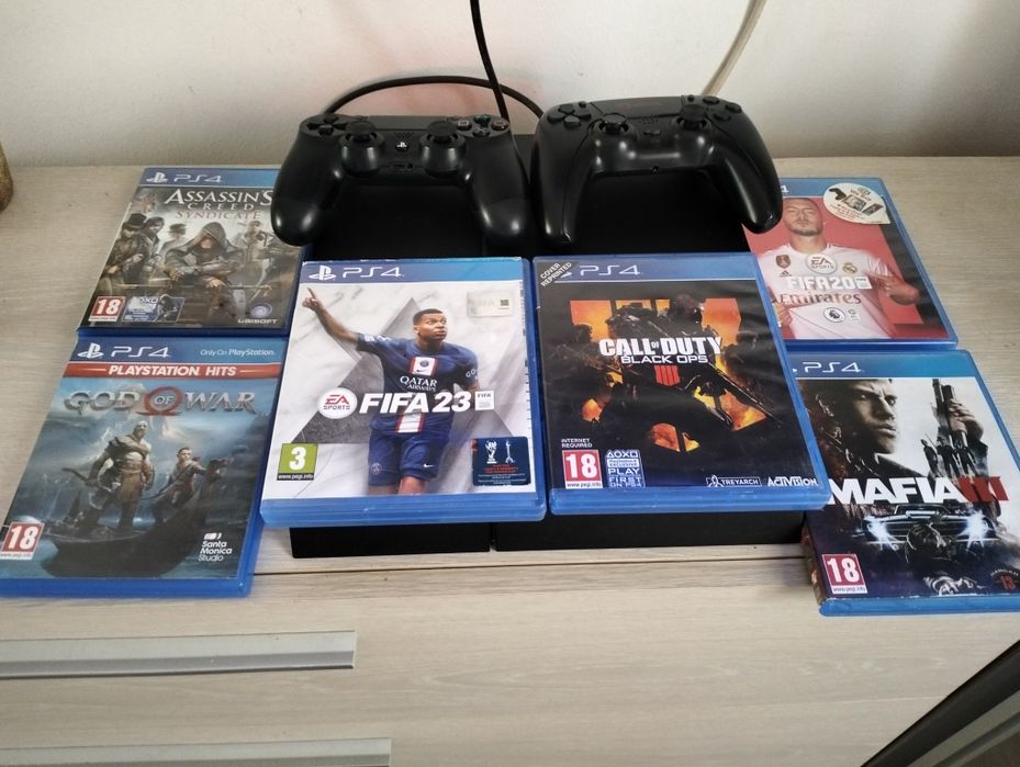 PlayStation 4 cu 7 jocuri și controler